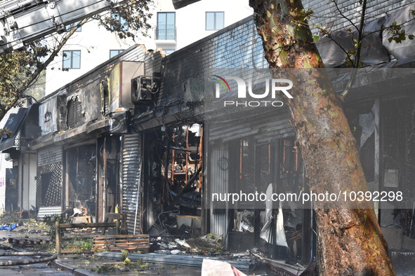 5-alarm fire in Brooklyn, New York, United States on August 20, 2023 damages several stores on Lee Avenue Sunday. Several firefighters were...