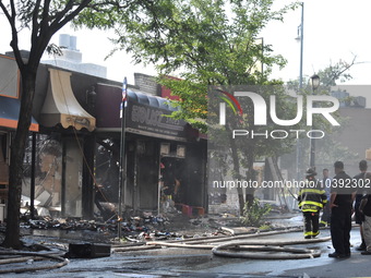 5-alarm fire in Brooklyn, New York, United States on August 20, 2023 damages several stores on Lee Avenue Sunday. Several firefighters were...