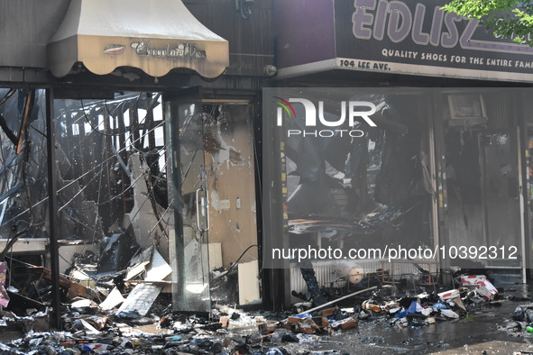 5-alarm fire in Brooklyn, New York, United States on August 20, 2023 damages several stores on Lee Avenue Sunday. Several firefighters were...