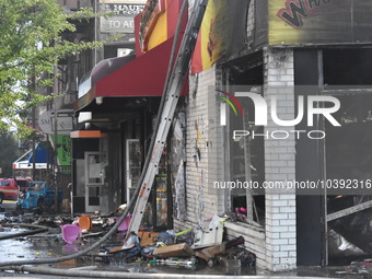 5-alarm fire in Brooklyn, New York, United States on August 20, 2023 damages several stores on Lee Avenue Sunday. Several firefighters were...