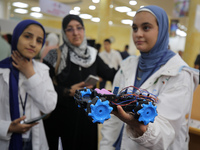 Palestinian students take part in a festival of the Science Days Palestine, at al Qattan Center in Gaza city on August 21, 2023. 
 (