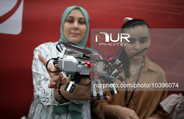 Palestinian students take part in a festival of the Science Days Palestine, at al Qattan Center in Gaza city on August 21, 2023. 
 