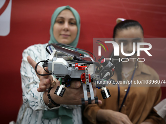 Palestinian students take part in a festival of the Science Days Palestine, at al Qattan Center in Gaza city on August 21, 2023. 
 (