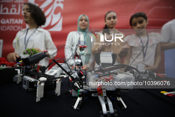 Palestinian students take part in a festival of the Science Days Palestine, at al Qattan Center in Gaza city on August 21, 2023. 
 