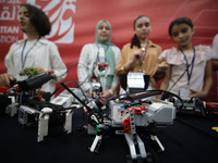 Palestinian students take part in a festival of the Science Days Palestine, at al Qattan Center in Gaza city on August 21, 2023. 
 (