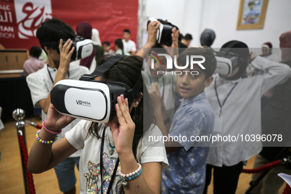 Palestinian students take part in a festival of the Science Days Palestine, at al Qattan Center in Gaza city on August 21, 2023. 
 