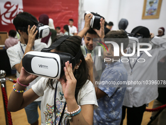 Palestinian students take part in a festival of the Science Days Palestine, at al Qattan Center in Gaza city on August 21, 2023. 
 (