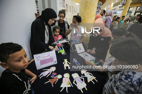 Palestinian students take part in a festival of the Science Days Palestine, at al Qattan Center in Gaza city on August 21, 2023. 
 