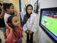 Palestinian students take part in a festival of the Science Days Palestine, at al Qattan Center in Gaza city on August 21, 2023. 
 (