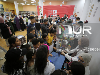 Palestinian students take part in a festival of the Science Days Palestine, at al Qattan Center in Gaza city on August 21, 2023. 
 (