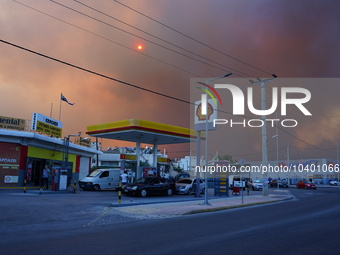 A view of the fire at Mountain Parnitha from the Central square of Ano Liosia 22/8/23 (