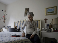 Catia Lattouf, health couch, rescuer and hummingbird keeper, inside her apartment in Mexico City. (