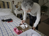 Catia Lattouf, health couch, rescuer and hummingbird keeper, feeds injured hummingbirds inside her apartment in Mexico City. (