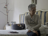 Catia Lattouf, health coucher, rescuer and hummingbird keeper, inside her apartment in Mexico City. (