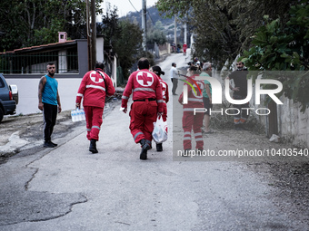 Members of the Red Cross are helping the residents of Mount Parnitha in Athens, Greece, on August 23, 2023 (