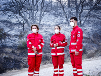 Members of the Red Cross are helping the residents of Mount Parnitha in Athens, Greece, on  August 23, 2023 (