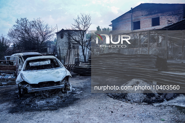 Burning cars are being destroyed by the fire on Mount Parnitha in Athens, Greece, on August 23, 2023 