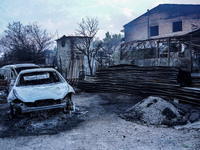 Burning cars are being destroyed by the fire on Mount Parnitha in Athens, Greece, on August 23, 2023 (