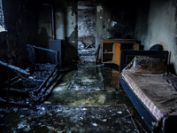 A house is being destroyed by fire on Mount Parnitha in Athens, Greece, on August 23, 2023 (