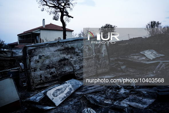 A house is being destroyed by fire on Mount Parnitha in Athens, Greece, on August 23, 2023 