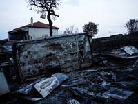 A house is being destroyed by fire on Mount Parnitha in Athens, Greece, on August 23, 2023 (