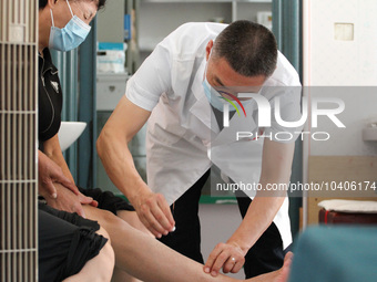 LINYI, CHINA - AUGUST 25, 2023 - A doctor performs balanced acupuncture for villagers in Linyi city, Shandong province, Aug 25, 2023. Throug...