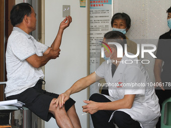 LINYI, CHINA - AUGUST 25, 2023 - A doctor performs balanced acupuncture for villagers in Linyi city, Shandong province, Aug 25, 2023. Throug...