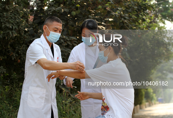 LINYI, CHINA - AUGUST 25, 2023 - A doctor performs balanced acupuncture for villagers in Linyi city, Shandong province, Aug 25, 2023. Throug...