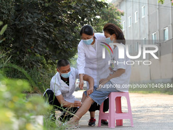 LINYI, CHINA - AUGUST 25, 2023 - A doctor performs balanced acupuncture for villagers in Linyi city, Shandong province, Aug 25, 2023. Throug...