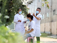 LINYI, CHINA - AUGUST 25, 2023 - A doctor performs balanced acupuncture for villagers in Linyi city, Shandong province, Aug 25, 2023. Throug...