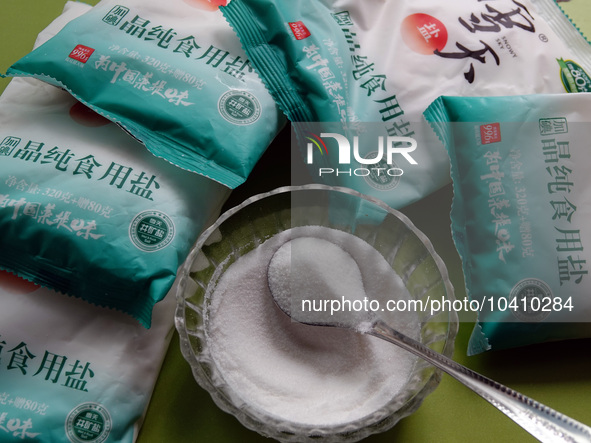 YICHANG, CHINA - AUGUST 26, 2023 - A citizen shows salt he bought in Yichang, Hubei province, China, Aug 26, 2023. Recently, affected by the...