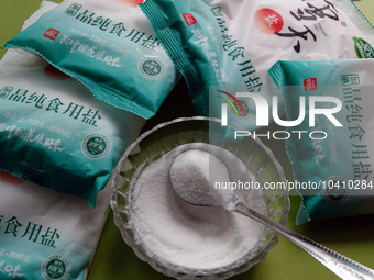 YICHANG, CHINA - AUGUST 26, 2023 - A citizen shows salt he bought in Yichang, Hubei province, China, Aug 26, 2023. Recently, affected by the...