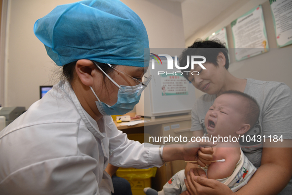 GUIYANG, CHINA - AUGUST 30, 2023 - A medical worker inoculates infants against influenza in Guiyang, Guizhou province, China, August 30, 202...