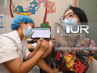 GUIYANG, CHINA - AUGUST 30, 2023 - A medical worker inoculates people against influenza in Guiyang, Guizhou province, China, August 30, 2023...