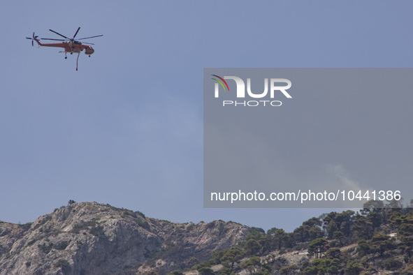 Mount Parnitha wildfire at the outskirts of Athens with visible smoke after the catastrophic blaze, resulting in an environmental disaster,...