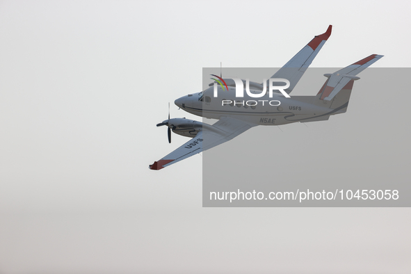 A firefighting aircraft is seen in Walker County, Texas on September 2, 2023.  