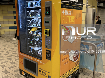 Vending machine offering face masks and hand sanitizer at a subway station in Toronto, Ontario, Canada on August 19, 2023. Heath officials h...