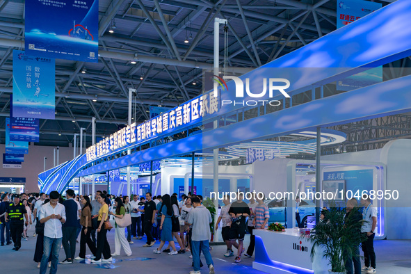  People visit the booth of the Chongqing High-tech Zone at the 2023 SMART CHINA EXPO in Chongqing, China, Sept. 5, 2023. 