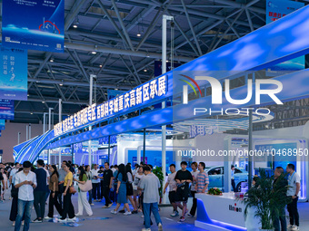  People visit the booth of the Chongqing High-tech Zone at the 2023 SMART CHINA EXPO in Chongqing, China, Sept. 5, 2023. (