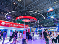  Citizens visit the booth of CHINA Unicom at the 2023 SMART CHINA EXPO in Chongqing, China, Sept. 5, 2023. (