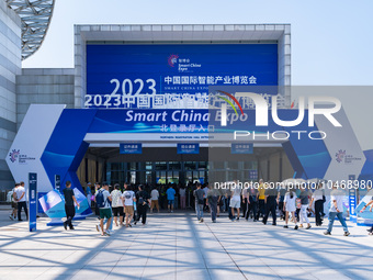  People queue to enter the 2023 SMART CHINA EXPO in Chongqing, China, Sept. 5, 2023. (