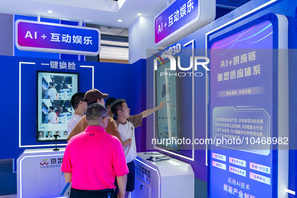  Citizens experience AI+ interactive entertainment at the 2023 SMART CHINA EXPO in Chongqing, China, September 5, 2023. 