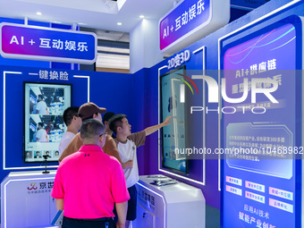  Citizens experience AI+ interactive entertainment at the 2023 SMART CHINA EXPO in Chongqing, China, September 5, 2023. (