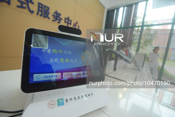 A hearing deaf communication intelligent robot is pictured at the Service center of Hangzhou Rehabilitation Hospital in Hangzhou, Zhejiang p...