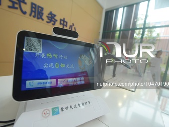 A hearing deaf communication intelligent robot is pictured at the Service center of Hangzhou Rehabilitation Hospital in Hangzhou, Zhejiang p...