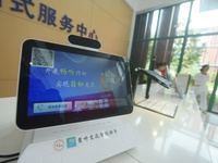 A hearing deaf communication intelligent robot is pictured at the Service center of Hangzhou Rehabilitation Hospital in Hangzhou, Zhejiang p...