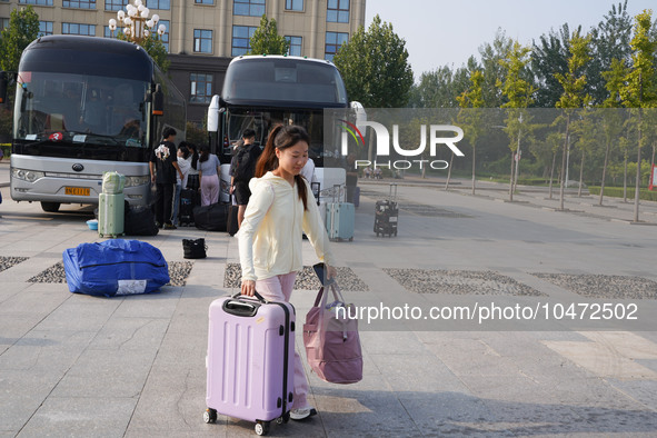 DEZHOU, CHINA - SEPTEMBER 7, 2023 - Students of Dezhou University in Shandong province carry their luggage and prepare to go to the grassroo...