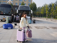 DEZHOU, CHINA - SEPTEMBER 7, 2023 - Students of Dezhou University in Shandong province carry their luggage and prepare to go to the grassroo...