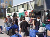 DEZHOU, CHINA - SEPTEMBER 7, 2023 - Students of Dezhou University in Shandong province carry their luggage and prepare to go to the grassroo...