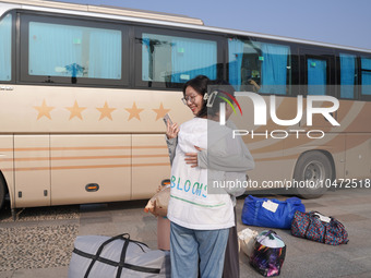 DEZHOU, CHINA - SEPTEMBER 7, 2023 - Two volunteer students from Shandong Dezhou University hug each other in Dezhou city, Shandong province,...